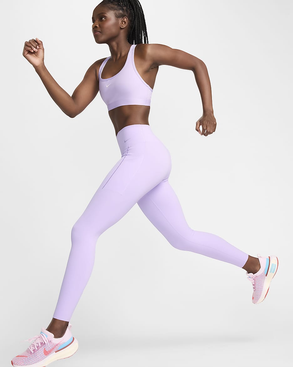 Legging long taille mi haute a maintien normal avec poches Nike Universa pour femme. Nike FR